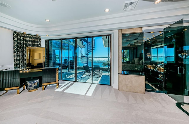 entryway with carpet floors, visible vents, and recessed lighting