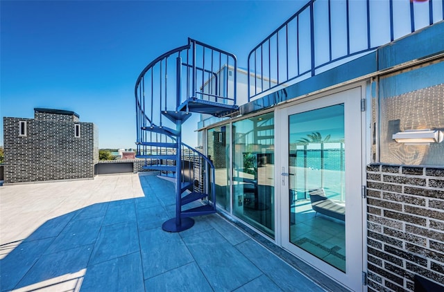 view of patio / terrace with stairway