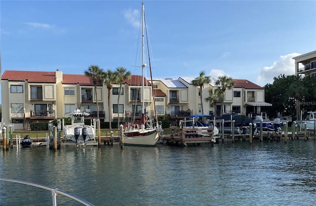 property view of water featuring a boat dock