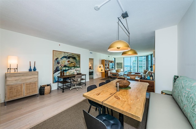 dining room featuring light hardwood / wood-style floors