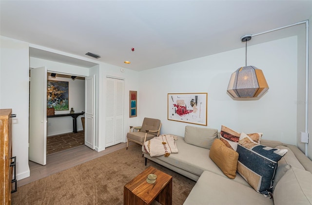 living room with light hardwood / wood-style flooring