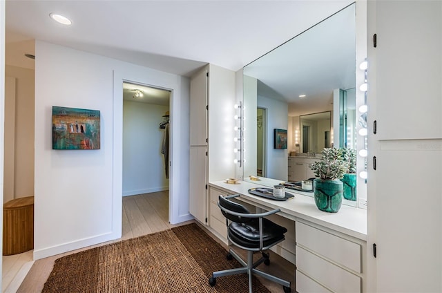 home office featuring hardwood / wood-style floors