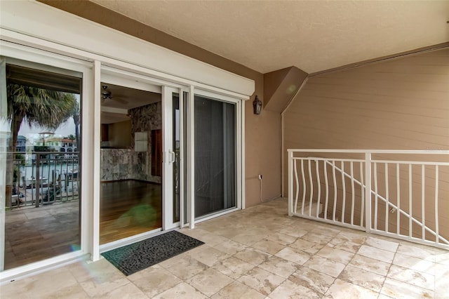 property entrance with a patio area