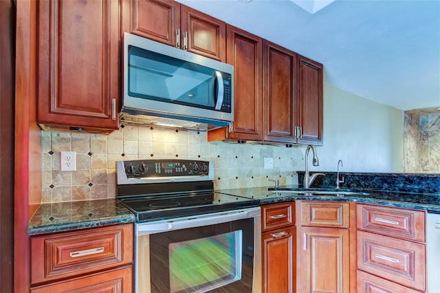 kitchen featuring electric stove, tasteful backsplash, sink, and dark stone counters