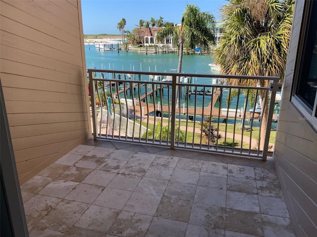 balcony featuring a water view