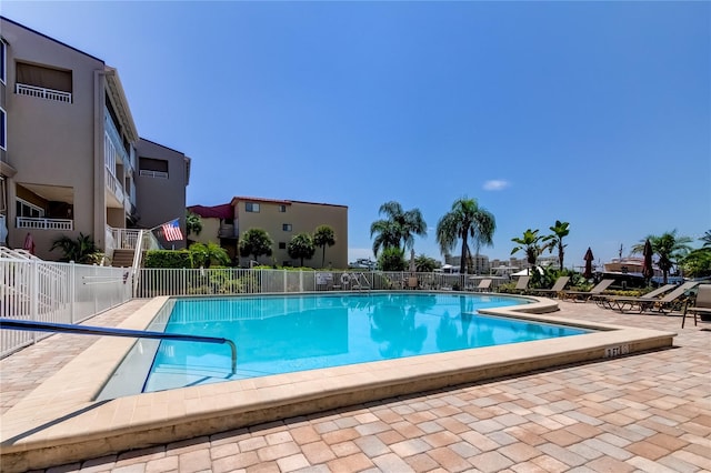 view of pool featuring a patio