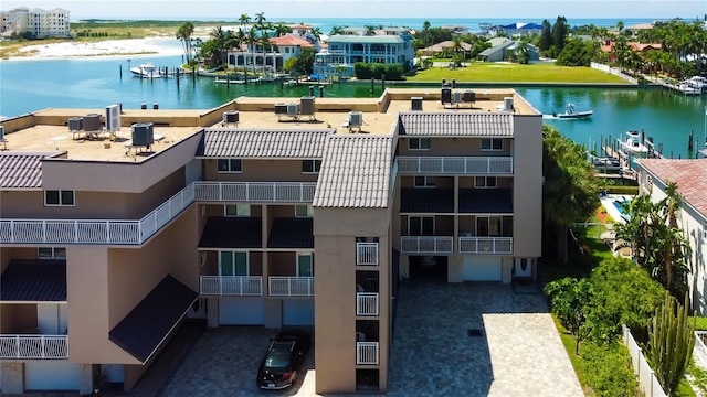 view of building exterior featuring a water view