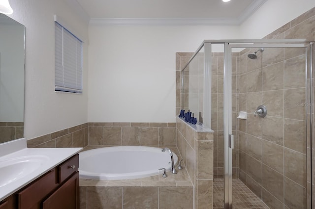 bathroom featuring crown molding, vanity, and independent shower and bath