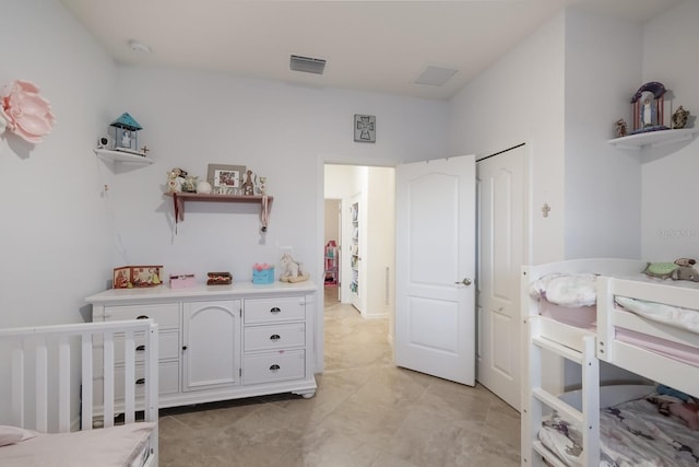 bedroom featuring light tile flooring