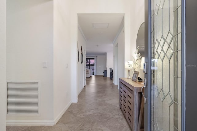 hallway featuring light tile floors