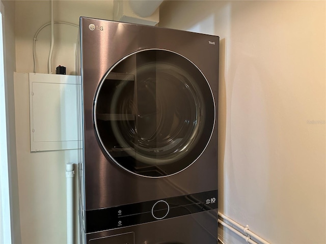 interior space featuring stacked washer and dryer