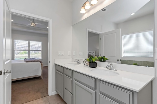 bathroom with vanity and tile patterned flooring