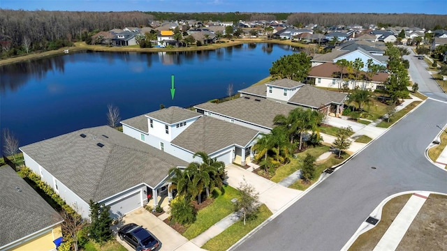 bird's eye view with a water view