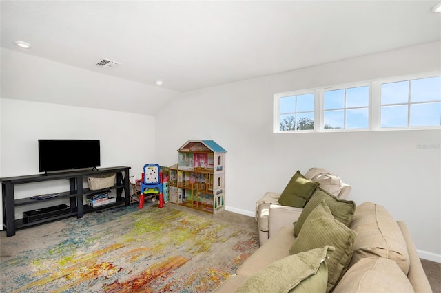 recreation room with carpet and lofted ceiling