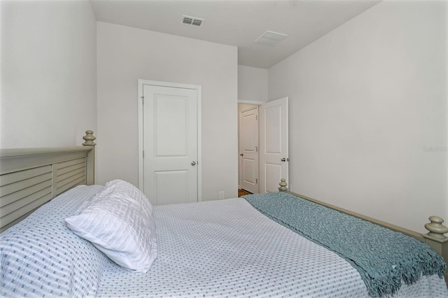 bedroom with visible vents