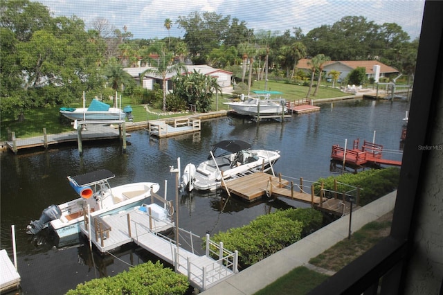 view of dock featuring a water view and boat lift