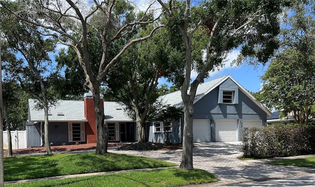 view of front of property with a garage