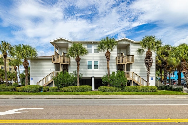 view of front of property with a balcony