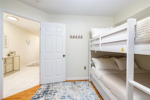 bedroom with wood-type flooring