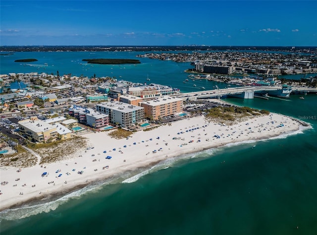 drone / aerial view with a view of the beach and a water view