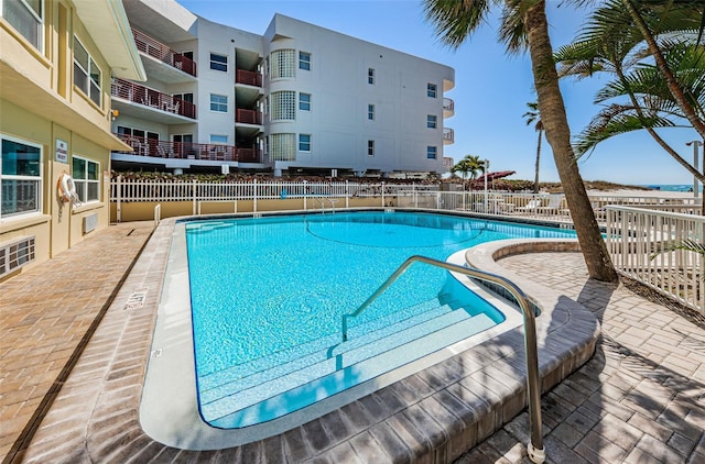 view of pool featuring a patio area