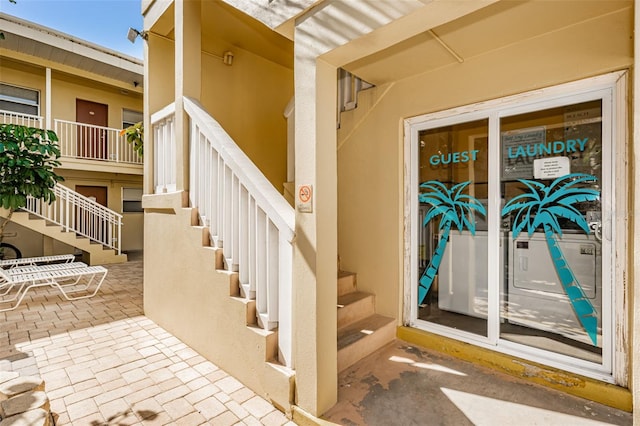 entrance to property with a balcony