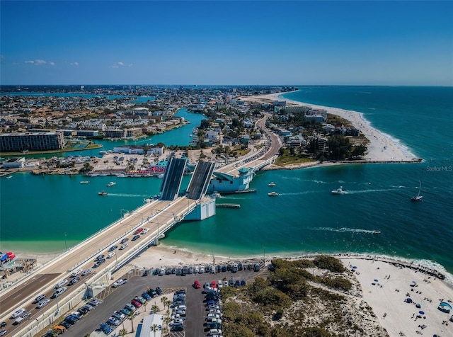 drone / aerial view with a view of the beach and a water view