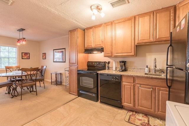 kitchen with pendant lighting, sink, black appliances, light carpet, and a textured ceiling