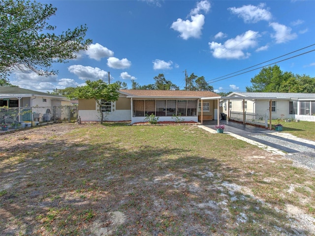 view of front facade with a carport