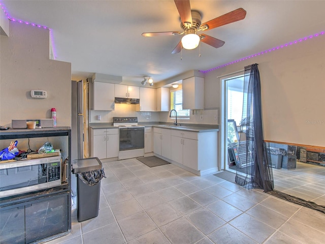 kitchen featuring white cabinets, white range with electric cooktop, ceiling fan, and light tile floors