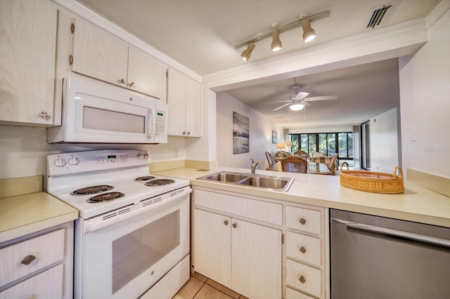 kitchen featuring ceiling fan, light tile flooring, white appliances, track lighting, and sink