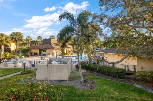 view of yard with a patio area and a community pool