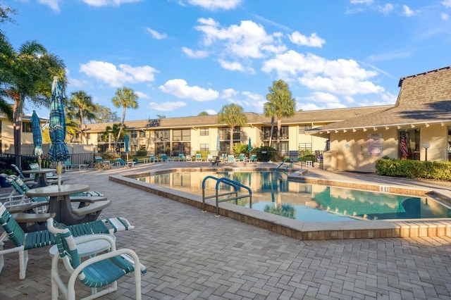 view of pool featuring a patio area