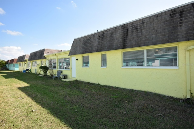 exterior space featuring a lawn