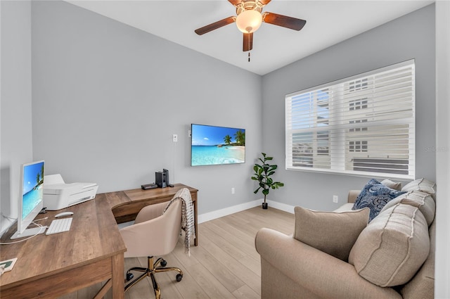 home office featuring ceiling fan and light wood-type flooring