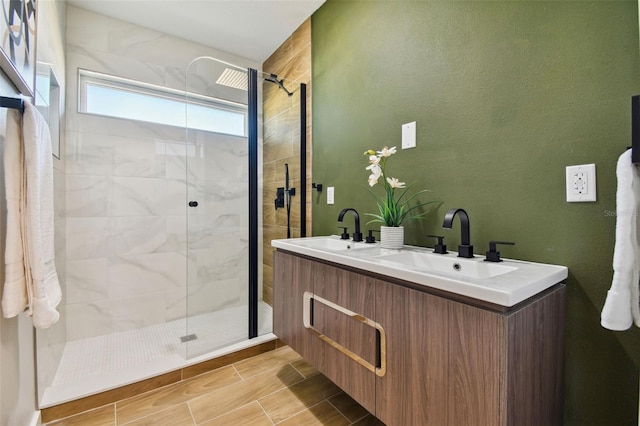 bathroom with vanity and walk in shower