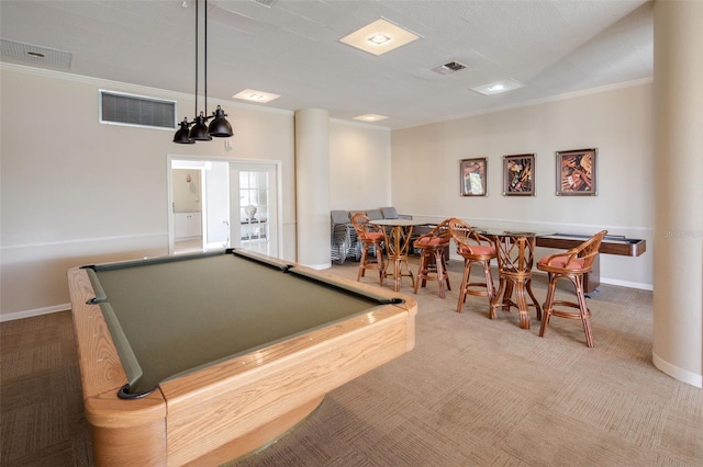 game room featuring light colored carpet, french doors, pool table, and ornamental molding