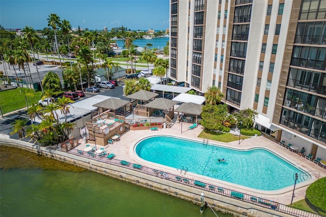 view of swimming pool with a patio area