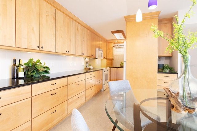 kitchen featuring light brown cabinetry, white appliances, pendant lighting, and tasteful backsplash