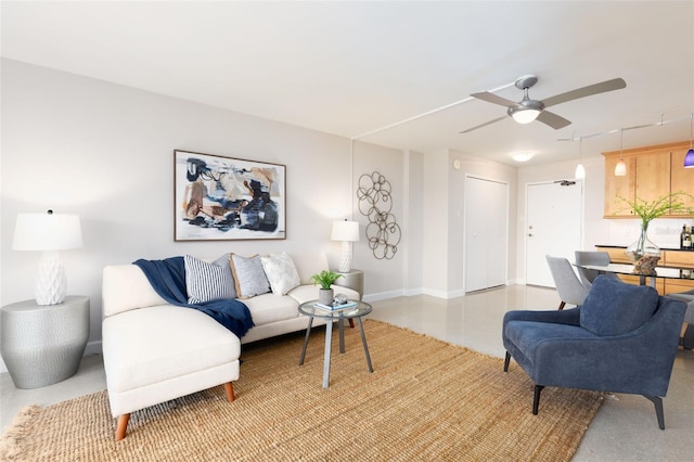 living room featuring ceiling fan