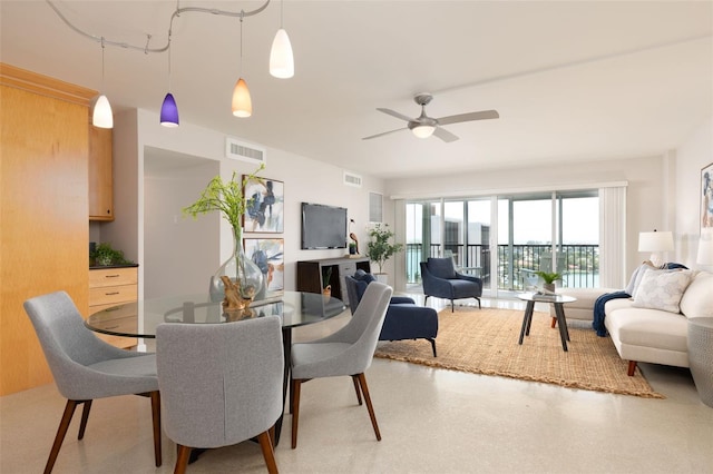 dining space featuring ceiling fan