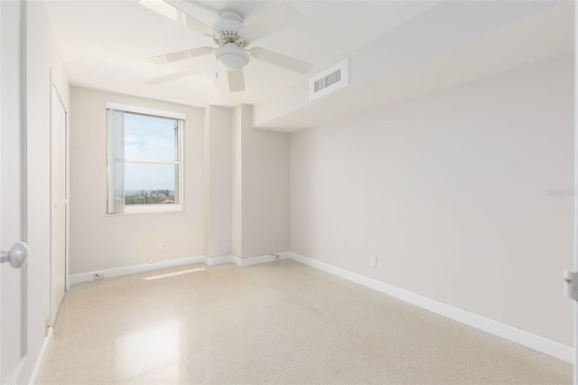 unfurnished room featuring ceiling fan