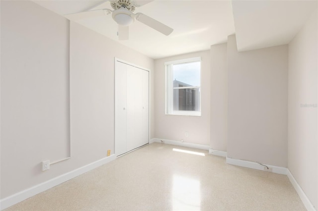 unfurnished room with ceiling fan