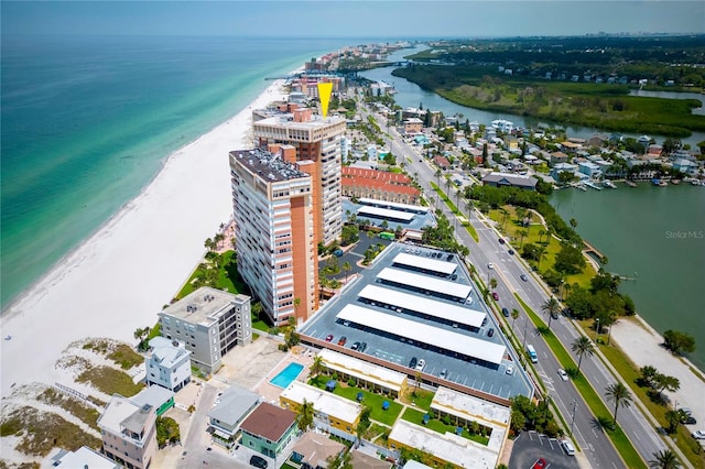 bird's eye view featuring a view of the beach and a water view