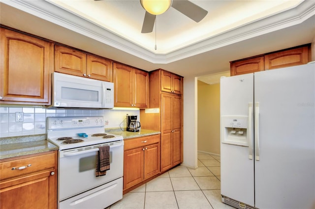 kitchen featuring backsplash, crown molding, white appliances, and ceiling fan