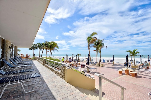 view of terrace featuring a water view