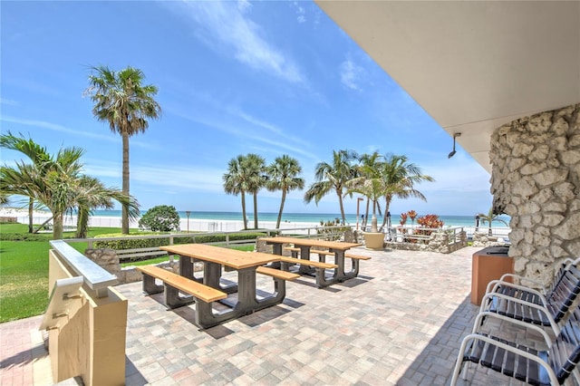 view of patio / terrace with a water view