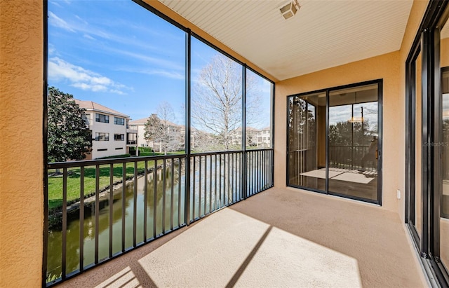 unfurnished sunroom with a healthy amount of sunlight