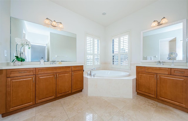 bathroom featuring a bath to relax in, tile flooring, dual sinks, and vanity with extensive cabinet space