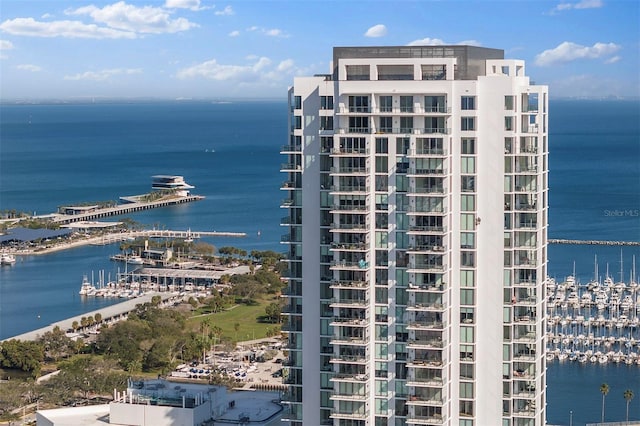 view of building exterior with a water view